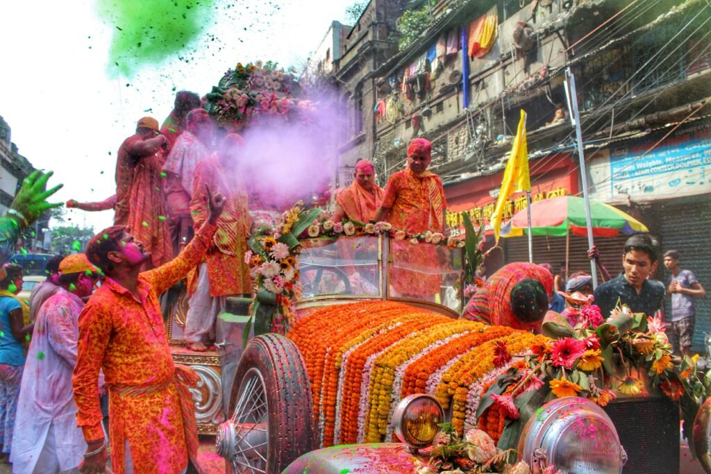 Crowd celebrating Ratha Yatra festival with colorful chariot in Kolkata for India Cultural Travel 2025