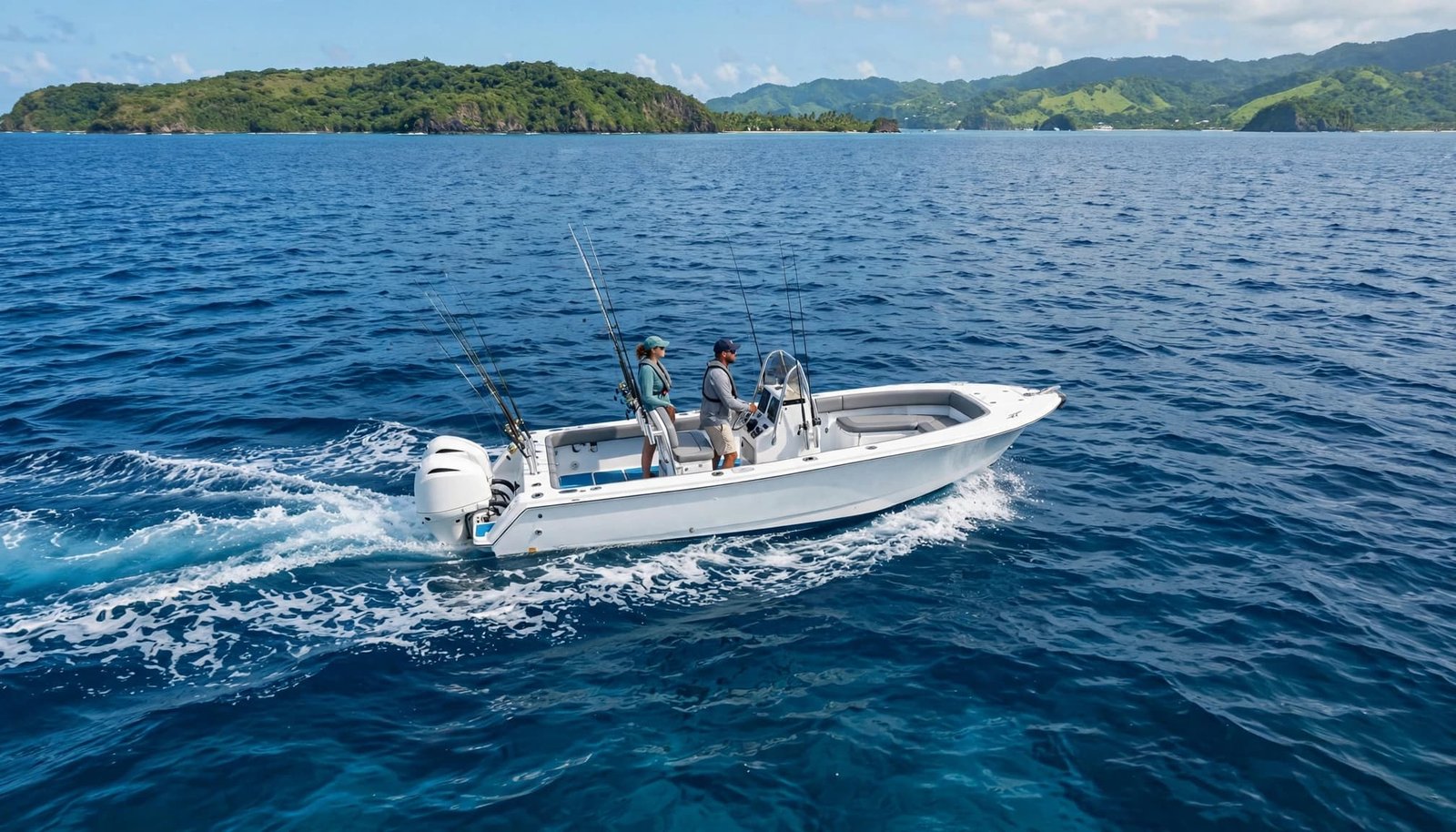 A small fishing boat with two anglers passes a green coastline on blue water.